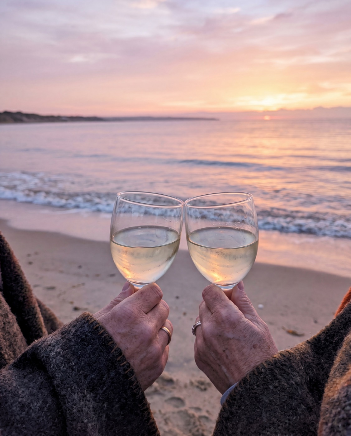 Quiet toast on the beach at sunrise